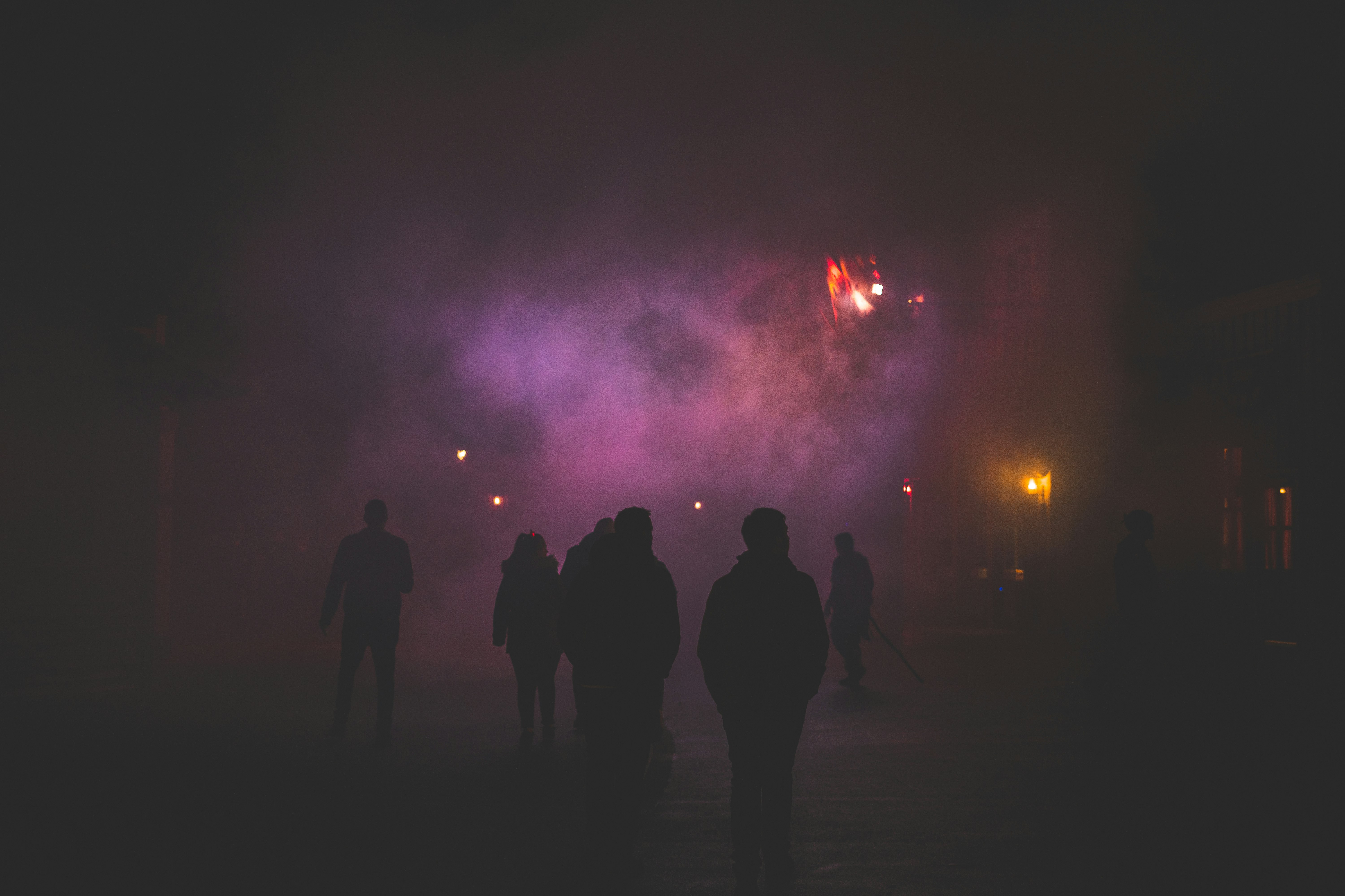 silhouette of people at night